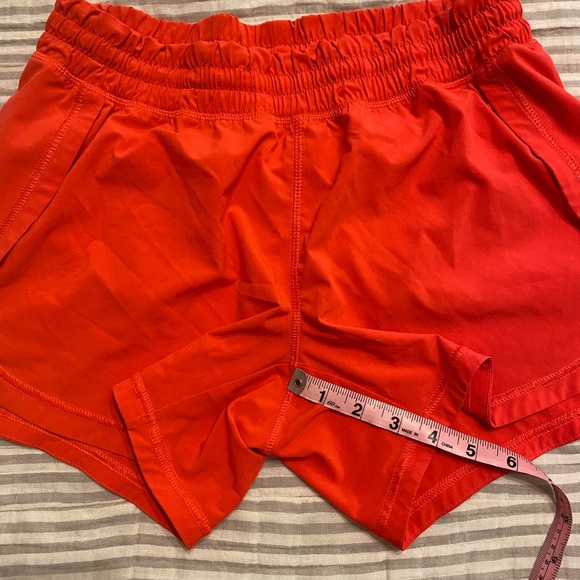 Athleta orange size small shorts. - Picture 3 of 4